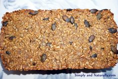 a granola bar with nuts and seeds on top