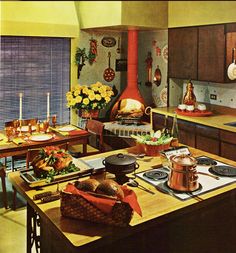 an old fashioned kitchen with lots of counter space and cooking utensils on the counters