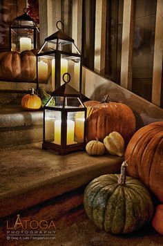 a painting of pumpkins and lanterns on the steps