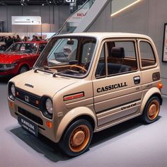 an old car is on display in a showroom