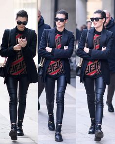 two pictures of a woman in black leather pants and jacket with her arms crossed while looking at her cell phone