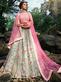 look Stunning by wearing this pista green lehenga in soft net material embellished with dori,thread and zari work all over.
Comes with a pink choli in soft net embellished with sequins work and soft net dupatta with embroidery work in pink color. 
This beautiful pista green and pink lehenga choli is semi stitched, can be customized up to 42 inches. Grey Lehenga, Green Lehenga Choli, Heavy Lehenga, Bridal Lehenga Online, Ghaghra Choli, Floral Lehenga, Lehenga Choli Wedding, Net Blouses, Bollywood Lehenga