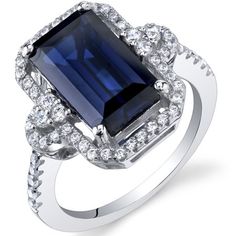 This 4.5 cts Rectangular Shape Created Blue Sapphire Ring in Sterling Silver is just right for a special occasion or everyday wear. Featuring a 4.5ct Created Blue Sapphire and accented with sparkling white Cubic Zirconia, this ring is beautifully crafted in pure 925 Sterling Silver. A rhodium finish coats this ring to ensure the shine lasts longer. This ring comes attractively packaged in a signature gift box. Size: 9.  Gender: female.  Age Group: adult. Mama Ring, Uncanny Avengers, Silver Halo Ring, Jewelry Questions, Sapphire Cocktail Ring, Emerald Rings, Casual Rings, Ring Styles, Blue Sapphire Ring