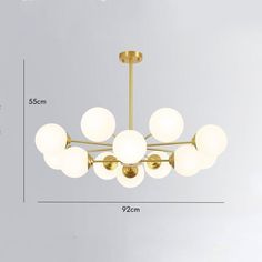 an image of a chandelier with white balls on it