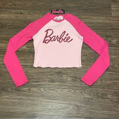 Nwt Glitter Barbie Long Sleeve Cropped Shirt Pink Size Large Adorable And Comfy, Very Stretchy! 95% Cotton/ Algodn 5% Spandex / Elastano Rn# 86947 Made In China Smoke Free Home Measurements Are In Pictures And Are Approximate Pink Letter Print Top For Party, Glitter Long Sleeve Tops For Winter, Pink Letter Print Party Top, Glitter Long Sleeve Winter Tops, Fitted Glitter Tops For Winter, Long Sleeve Glitter Tops For Winter, Long Sleeve Glitter Top For Winter, Winter Glitter Long Sleeve Tops, Stretch Glitter Tops For Fall