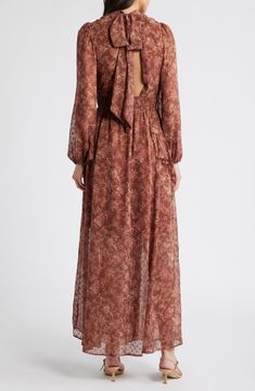 Be endlessly enchanting in the flowery chiffon maxi designed with floaty cascading ruffles and a shaping smocked waist. 58" length Adjustable back-tie closure Mock neck Long sleeves Smocked waist Partially lined 100% polyester Dry clean or hand wash, line dry Imported Maxi Design, Cascading Ruffles, Chiffon Maxi, Sleeve Maxi Dress, Long Sleeve Maxi, Long Sleeve Maxi Dress, Nordstrom Dresses, Mock Neck, Smocking