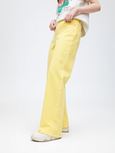 Details: Warm and healing cheese yellow toned jeans Relaxed, straight fit Dinosaur and U-Cat print on the back for a fun street look Materials & Care: Cotton: 98.5%. Spandex: 1.5% 30° wash, gentle dry clean Do not bleach Size & Fit: Model is 5'7", Bust 32, Waist 24, Hips 35, wearing a size S Item #: LN1DP02 Yellow Wide Leg Jeans For Fall, Yellow Casual Jeans For Spring, Casual Yellow Pants With Five Pockets, Casual Yellow Mid-rise Jeans, Casual Yellow Jeans For Spring, Trendy Yellow Wide Leg Jeans, Yellow Wide Leg Jeans For Summer, Yellow Denim Bottoms For Fall, Trendy Yellow Summer Jeans