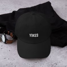 Yikes Embroidered Dad Hat, Funny Hats, Dad Hats, Adjustable Strap, Meme Hats America Hat, Embroidery Caps, Funny Hats, Embroidered Caps, Camo Colors, Dad Life, Embroidered Hats, Crazy Dog, Green Camo