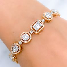 This opulent 18k gold bracelet, weighing 16.1 grams, features a luxurious combination of rose and white gold. Adorned with 4.30 carats of diamonds in various shapes—round, marquise, square, and baguettes—this bracelet dazzles with its F-G color grade and VS quality stones. Measuring 7 inches, it offers a comfortable and perfect fit. The secure hinge and clasp with lock ensure both style and practicality. Ideal for those who appreciate sophisticated craftsmanship and timeless beauty, this exquisi Rose Gold Baguette Cut Tennis Bracelet For Formal Occasions, Elegant Rose Gold Baguette Cut Tennis Bracelet, Formal Rose Gold Baguette Cut Tennis Bracelet, Elegant Rose Gold Baguette Diamond Tennis Bracelet, Luxury Rose Gold Jewelry With Baguette Diamonds, Rose Gold Baguette Cut Diamond Bracelet, Fine Jewelry Rose Gold Diamond Bracelet With Baguette Cut, Luxury Rose Gold Diamond Bracelet With Baguette Diamonds, Elegant Baguette Cut Rose Gold Diamond Bracelet