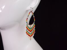 Festival Jewelry With Beaded Fringe, Festival Teardrop Beaded Fringe Jewelry, Multicolor Fringe Dangle Jewelry, Rainbow Fringe Dangle Jewelry, Bohemian Teardrop Beaded Fringe Jewelry, Nickel-free Teardrop Beaded Earrings For Festivals, Rainbow Fringe Dangle Earrings, Rainbow Dangle Earrings With Fringe, Bohemian Rainbow Teardrop Earrings