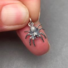 Sterling Silver Spider Charm with 6mm sterling silver open jump ring. The finished charm measures 17mm x 12mm.  This listing is for 1 charm. MORE Charms, Dangles and Pendants: http://www.thedanglediva.etsy.com FOLLOW me: www.facebook.com/thedanglediva for new designs and discount coupons INTERCHANGEABLE EARRINGS: https://www.etsy.com/shop/TheDangleDiva?ref=hdr_shop_menu&section_id=20069837 NECKLACE CHAINS: https://www.etsy.com/shop/TheDangleDiva?ref=hdr_shop_menu&section_id=10168783 CUSTOM ORDER Silver Novelty Charm Necklace, Silver Halloween Charms Jewelry, Halloween Silver Charm Jewelry, Silver Halloween Jewelry With Charms, Novelty Pendant Jewelry With Charms, Novelty Sterling Silver Charm Jewelry, Silver Novelty Jewelry With Lobster Clasp, Novelty Sterling Silver Jewelry With Charms, Novelty Silver Pendant Jewelry