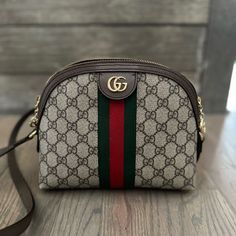 Gucci Ophidia Textured Leather-Trimmed Printed Coated-Canvas Shoulder Bag. Only Used A Few Times, Looks Brand New Gucci Beige Bag With Zipper Closure, Beige Gucci Bag With Zipper Closure, Beige Gucci Bag With Zipper, Ophidia Gg Small Shoulder Bag, Gucci Marmont Mini, Red Web, Gucci Ophidia, Gucci Crossbody, Mini Bucket Bags