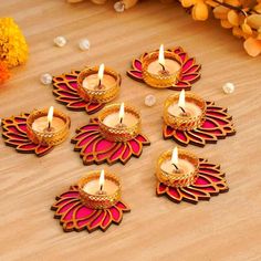 decorative diya with lit candles for diwaling