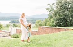 Mom in white and daughter in green hugging during a maternity session in NY Red Hook, Mint Dress, Mother And Daughter, Maternity Session, White Dress, Mint, Photographer