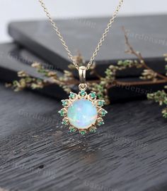 Round Opal Pendant Necklace vintage 14k gold emerald Pendant Necklace for Women Minimalist Necklace sun pendant Bridal Anniversary gift ABOUT THIS RING Beautiful Opal Pendant Necklace -------------------------------------------------------- 「Product Summary」 * Center Stone: 8mm natural opal(round) *Side Stone:1.3mm Lab emerald * Material available: solid 10k/14k /18k(rose/yellow/white gold) (choose from drop down menu) * **Cable Chain 16"-19" can be selected. Please contact me for other chain styles and sizes. Sizes available: 3-9 (Larger and smaller sizes are available.An additional larger size fee is required. please contact us first.) Please select your size at the drop down menu.  SHIPPING  Australia or America Return Address is available American orders will be shipped to you from Cal Opal Pendant Necklace Vintage, Emerald Pendant Necklace, Necklace Sun, Emerald Necklace Pendant, Pendant Necklace Vintage, Opal Pendant Necklace, Sun Pendant, Custom Wedding Rings, Full Eternity Ring