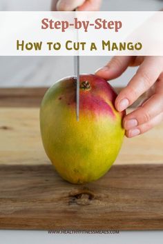 someone cutting an apple with a knife on a cutting board that says, step - by - step how to cut a mango