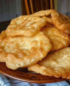 some fried food is on a brown plate