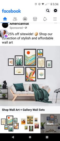 an image of a living room with pictures on the wall and in front of it