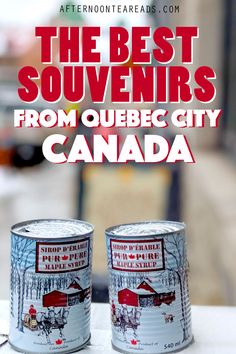 two cans of canned food sitting on top of a table with the words, the best souvenirs from quebec city canada