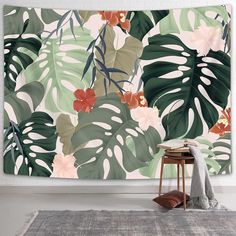 a large tropical wall hanging on the side of a room