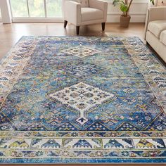 a large blue rug in a living room