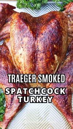 a turkey on a platter with parsley around it and the words traeger smoked spat chicago turkey