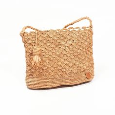 Raffia bag entirely hand crocheted in natural raffia from Madagascar Small shoulder bag, its strap is intertwined with a gold metal chain. - Materials: raffia and leather - Tea color -Fabric lining -Closing -Braided raffia shoulder strap -Dimensions: 27 x 21 cm, bottom: 6cm Natural Woven Leather Crossbody Straw Bag, Woven Straw Crossbody Beach Bag, Beach Jute Crossbody Straw Bag, Jute Crossbody Straw Bag For Beach, Summer Woven Crochet Crossbody Bag, Summer Crochet Woven Crossbody Bag, Everyday Braided Rattan Crochet Bag, Woven Straw Crossbody Crochet Bag, Woven Straw Crochet Crossbody Bag