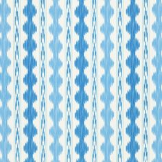 a blue and white striped fabric with an interesting design on it's side,