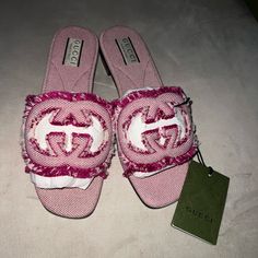 Women's Interlocking G Slide Sandal Gucci Designer Flat Sandals, Pink Gucci Slip-on Sandals, Gucci Casual Pink Sandals, Designer Flat Summer Heels, Casual Pink Gucci Sandals, Gucci Designer Slip-on Heels, Gucci Spring Slip-on Sandals, Pink Gucci Heels For Summer, Summer Pink Gucci Heels