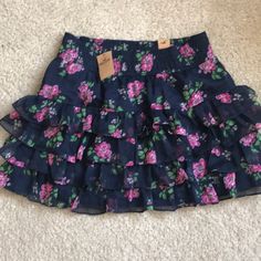 Blue And Pink Floral Hollister Skirt. Never Worn, New With Tags And Size Medium About Mid Thigh High And I Am 5’1”. Excellent Condition; Smoke Free Home. Would Be Super Cute With Tank Top. Hollister Skirt, Skirts Floral, Blue And Pink, Thigh High, Thigh Highs, Blue Purple, Pink Floral, Hollister, Blue And Purple