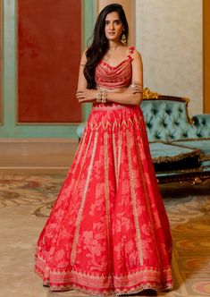 Featuring a cherry red floral and border printed hand embroidered cotton silk lehenga set paired with print highlighted blouse and net embroidered dupatta. It is crafted from our signature print. Rahul Khanna, Printed Lehenga, Drape Saree, Soho Nyc, Embroidered Dupatta, Red Fits, Nehru Jackets, Silk Lehenga, Western Wedding