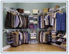 an organized closet with clothes and shoes