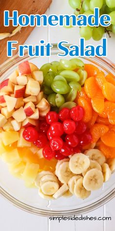 homemade fruit salad in a glass bowl with grapes and bananas