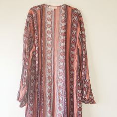 Nwot Band Of Gypsies Open Front Boho Kimono Aztec Robe. Earthy Red / Brown Tone With Dark Blue. Size Small. Good Condition. Fabric 100% Viscose Length 44" Red Bohemian Kimono For Fall, Fall Boho Print One-size Kimono, Fitted Red Bohemian Kimono, Fall Hippie Floral Print Kimono, Fall Floral Print Hippie Kimono, Fall Boho Print Open Front Kimono, Bohemian Floral Print Outerwear For Fall, Fall Floral Print Long Sleeve Kimono, Bohemian Floral Print Outerwear