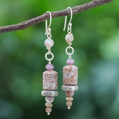 Siriporn's pale earrings are perfect for a walk through the woods. The Thai artisan hand threads grey agate beads, purple glass beads and brown jasper gems to create the earrings. Stamped 950 silver beads add a touch of shine, while sterling silver hooks complete the pair. Brown Jasper, Jasper Bead Bracelet, Rustic Earrings, Grey Agate, Earring Designs, Agate Earrings, Daily Walk, Jasper Beads, Purple Glass