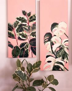 there are two paintings on the wall one is pink and the other has green leaves