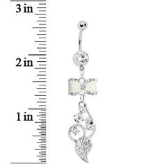 Product Details Get the look other will covet with this dazzling gem embellished dangle belly ring. This navel ring features a white enamel bowtie with a winding gem accented vine dangling beneath. An excellent and unique addition to any body jewelry collection. Specifications 14 Gauge (1.6mm), 7/16" (11mm), 316L Surgical Grade Stainless Steel, 5mm Ball Unique Belly Rings, Dangle Belly Rings, Navel Ring, Navel Rings, Belly Ring, Belly Rings, White Enamel, Get The Look, Body Jewelry