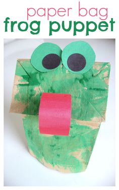 a paper bag frog puppet made with construction paper