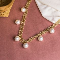 There is something about pearls and elegance.  This handmade dainty gold plated necklace with freshwater pearl drops is just beautiful! The necklace has two layers, it is adjustable and trendy. Wear it on special occasions and gift it to someone you love. It is just perfect. Style tip - Pair it with our pearl drop earrings and make a great set of earrings and necklace. Details: Metal - Brass Plating - Gold Plated Style - Bead Necklace Design - Statement and Classy Pearl Necklace Stone - Freshwat Pearl And Gold Necklace, Gold Necklace Wedding, Pearl Bead Necklace, Layered Pearl Necklace, Beaded Necklace Designs, Necklace Layered, Dainty Gold Necklace, Gold Pearl Necklace, Necklace Wedding