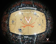 an overhead view of a basketball court with fans