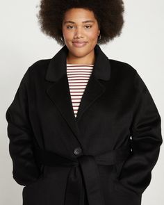 Meet your most luxurious coat. Made from a supremely soft, double-face wool blend, it’s warm and lightweight at once. Cut in a refined cocoon silhouette, this blanket-like top layer is completely reversible and features elevated finishes throughout. The self-belt is removable and can be worn on either side—secured with a button, so you don't have to worry about losing it! Additional details include the double button front closure and hip pockets. Wear this all season long, from day to night. Puffer Vest Fashion, Athleisure Pants, Weekend Dresses, Ponte Pants, Vest Fashion, Petite Jeans, Blazer Fashion, Everyday Dresses, Double Face