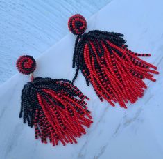 Approximately 3 inches. RED AND BLACK Adjustable Black Beaded Tassel Earrings, Black Beaded Tassel Earrings With Round Beads, Black Beaded Earrings With Tassels, Black Beaded Tassel Earrings, White Beads, Paw Print, Tassels, Beaded Earrings, Crochet Necklace