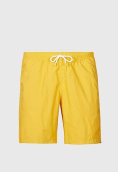 If you're heading to the beach or pool this summer, why not make a stylish splash? We love a timeless classic and nothing says summer quite like bright and colorful swim trunks. This easy and effortless nylon swim trunk looks great with a polo and a tan.
Elasticized drawstring waistTwo hip pocketsOne back patch pocket with drainage holeMesh linerQuick dryingUPF 50+ sun protectionMade in Spain Sport Clothing, Tuxedo Pants, Tuxedo Dress, Outerwear Vest, Polo Sweater, Lacing Sneakers, Mens Sportswear, Sports Jacket, Fall Sweaters