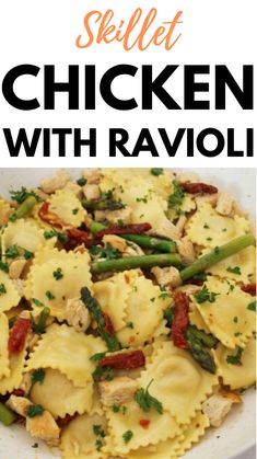 chicken with ravioli and asparagus in a white bowl