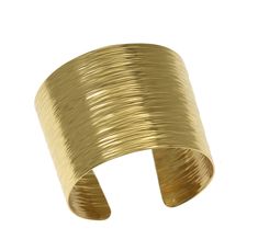 Wrap your wrist in modern elegance when you don this bold Nu-Gold Bark Cuff. The hand-chased texturing and clean lines lends a contemporary feel to the stylish piece. Wear it proudly with everything from work wear to your favorite evening outfits to prove your place on the runway of style. There is no better way to add warmth and shine to an ensemble than with a large statement cuff in gold, but genuine gold bracelets cost a small fortune. The Handmade Nu-Gold Bark Cuff Statement Bracelet lets y Modern Hammered Bangle For Formal Occasions, Modern Wide Band Adjustable Bracelets, Modern Hammered Bangle, Modern Hammered Cuff Bangle, Modern Hammered Cuff Bracelet For Formal Occasions, Copper Cleaner, 21st Wedding Anniversary, Cuff Bracelet Gold, Brass Cuff