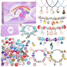 various charms and bracelets are displayed in front of a box with the contents on it