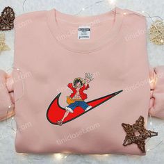 The Luffy One Piece x Nike Swoosh Shirt is a must-have for any anime fan. Featuring a stylish collaboration between Anime X Nike, Luffy Design, Anime Stand, Extraordinary Clothes, Nike Collection, Nike Design, Embroidered Shirts, Size Chart For Kids, Shirt Embroidery