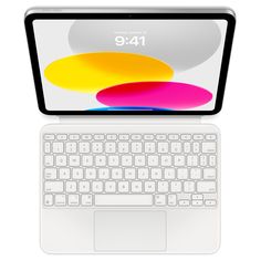 an open laptop computer sitting on top of a white surface