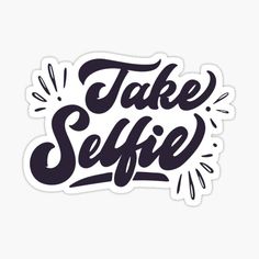 the words take selfie written in black ink on a white sticker with an arrow