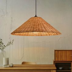 a light that is hanging over a table